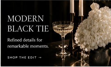 Modern Black Tie wedding edit with candles, crystal glassware and white florals